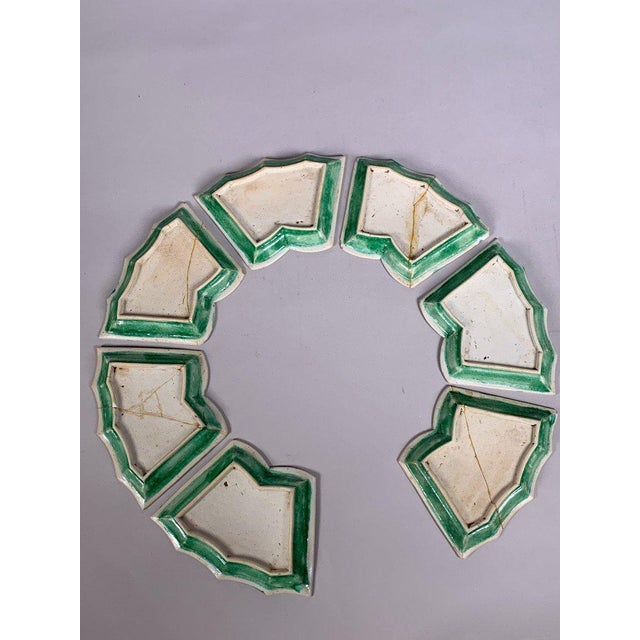 Set of 7 Chinese porcelain dishes, 18th century, decorated in the famille verte style with yellow and aubergine motifs....