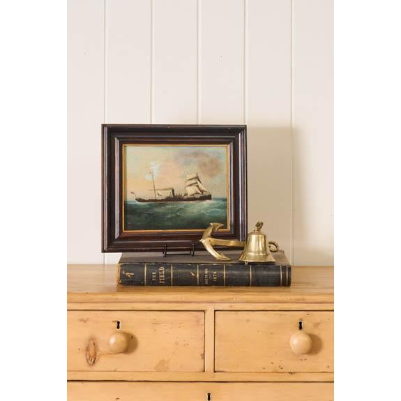 Original oil on canvas depicting a British steamship at sea, presented in an oak frame. Rich maritime detail and a muted...