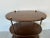 A stylish Vintage Baker Campaign - style solid mahogany oval three - tier side table. Featuring three - tiered solid...