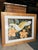 Beautiful vintage tropical bird artwork featuring a striking white cockatoo with a golden-yellow crest, perched among lush...