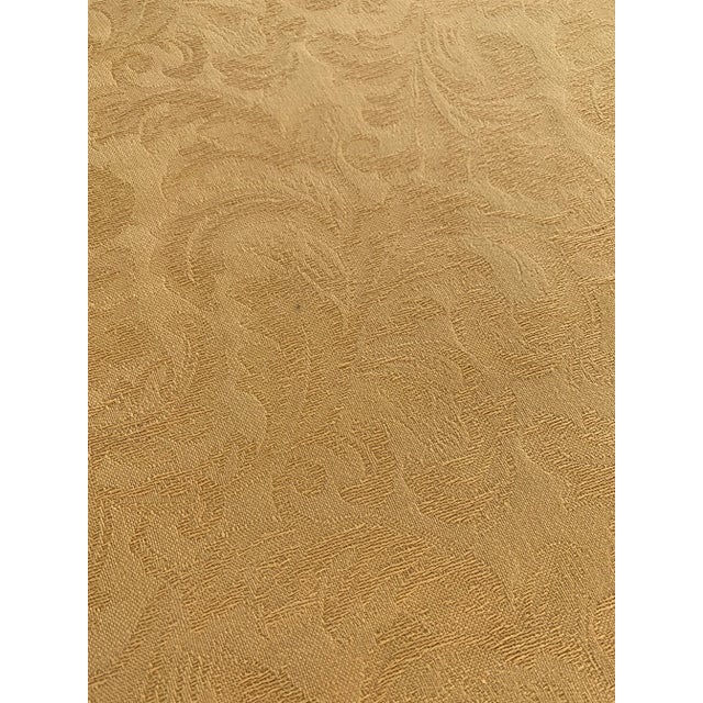 Golden yellow ,mustard color with an embossed like pattern. The photos are taken in different lighting and close ups to...