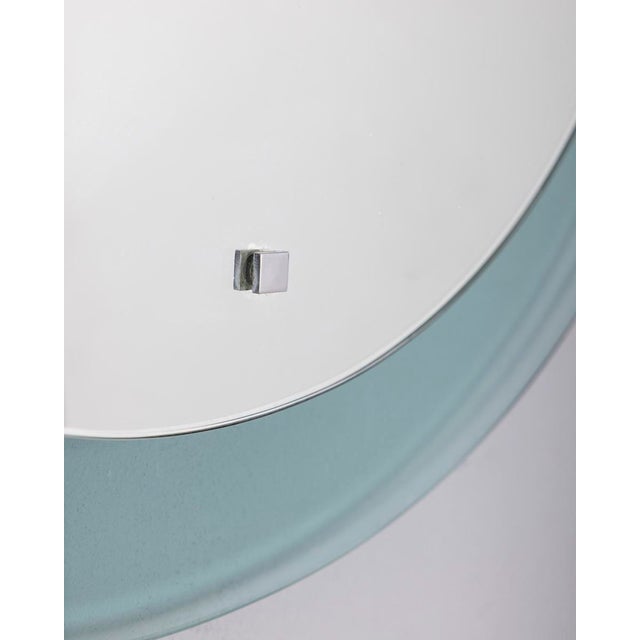 Round wall mirror with blue smoked glass frame, Italian design, 1970s.