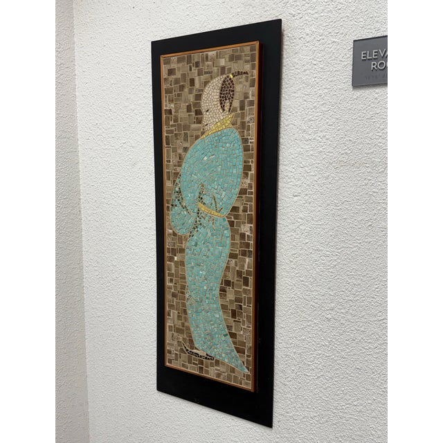 Design Plus Gallery presents a Vintage Frame Tile Mosaic Art Piece. The art piece is a mosaic that creates a male figure...