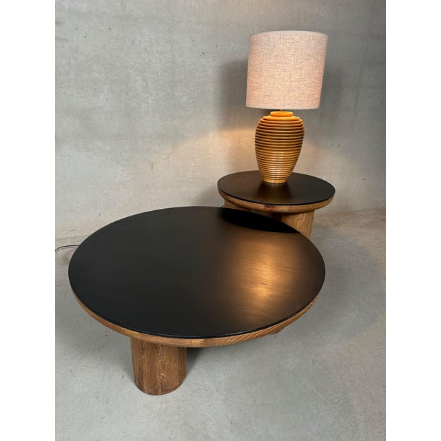 Two sturdy Japanese wooden coffee tables. They vary in height and diameter. Table 1: height: 36cm. Diameter: 90cm. Table...