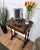 Beautiful antique Italian sewing table ideal as side or end table, characterized by typical beveled edge table top with...