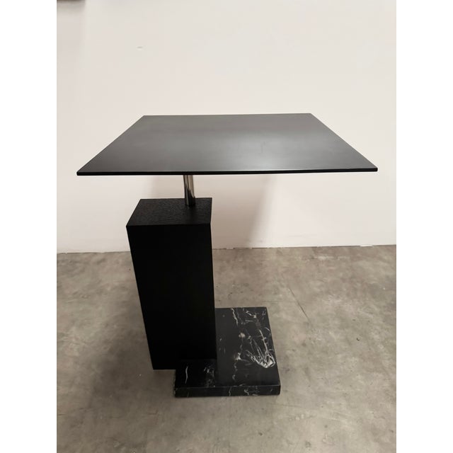 Marble and metal side table believed to be a Kelly Wearstler design for E J Victor.