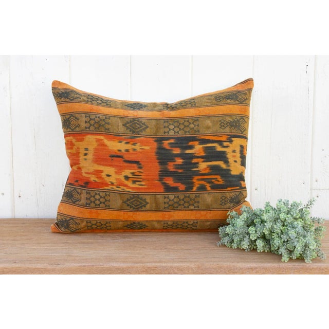 A magnificent antique Indonesian ikat ceremonial throw, now made into a one of a kind pillow. This antique ceremonial...