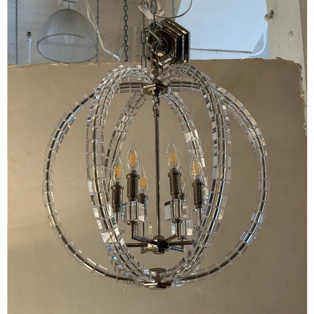 Design Plus Gallery presents the Crystal Cube Six-Light Chandelier from Visual Comfort Signature. Three intersecting...