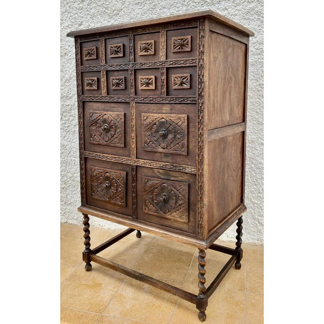 Spanish Wooden Storage Cabinet with Drawers, 1900s Beautiful Spanish storage unit from the early 20th century. It is...