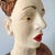 Striking figurative bust attributed to contemporary narrative sculptor Kirsten Stingle, combining a hand-worked ceramic...