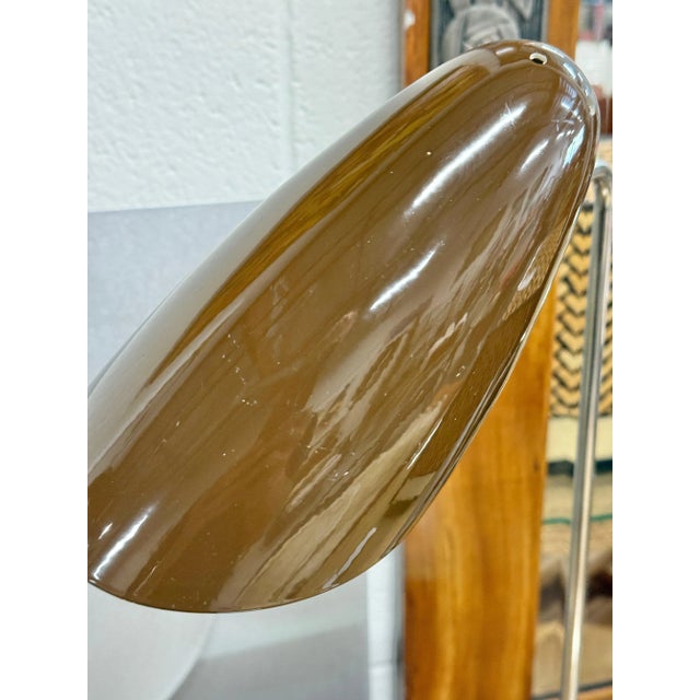 A nice pair of mated table or desk lamps by David Weeks Studio. They feature his iconic bullet lamp head on stands. The...