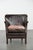 This lovely, subtle dark brown armchair made of cowhide leather with a reversible Kelim seat cushion. This lovely dark...