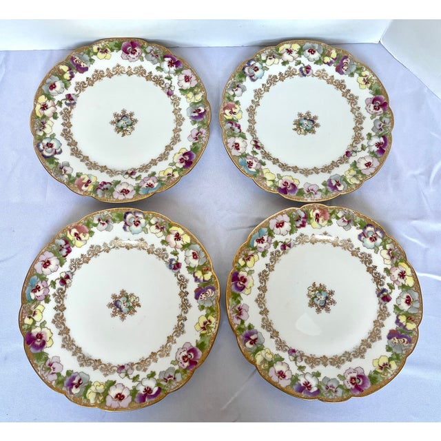 Exquisite set of four antique French Limoges porcelain dinner plates manufactured by Haviland France and retailed by the...