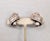 1950s silvertone scroll with studded design along the edges with a ball at the top and bottom clip earrings. Marked...