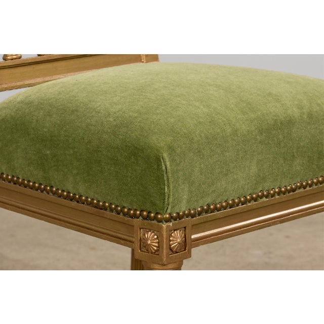 A refined set of six late 19th century French Louis XVI style dining chairs, sourced in Provence. The frames are finished...