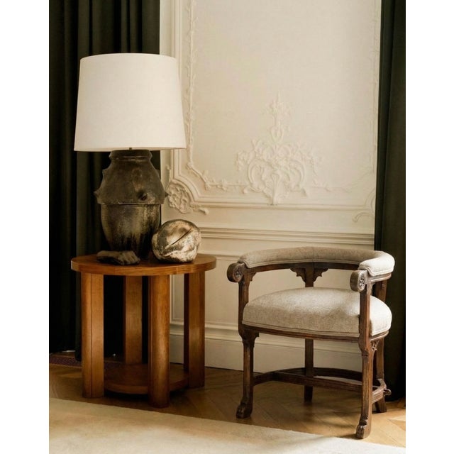 An elegant piece of 19th-century French craftsmanship, this upholstered chair brings old-world charm and timeless beauty...