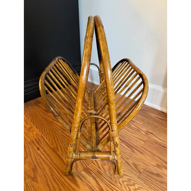 This magazine holder is a versatile and attractive piece! Not only do the sides easily collapse inward, it has pleasing...