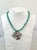 Lovely turquoise beaded necklace with vintage sterling silver pendant. Adjustable.