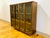 A lovely Broyhill Brasilia display cabinet/shelving unit atop custom metal hairpin legs. This piece features a pair of...