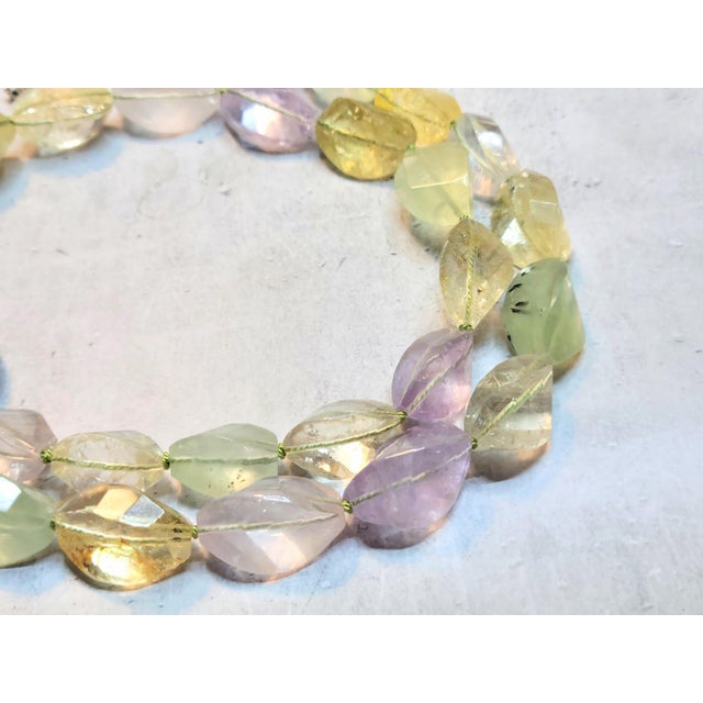 The necklace is 25 inches (63.5 cm) long, and the carved twist beads are from 20x13 mm to 18x12 mm in approximate size....