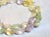 The necklace is 25 inches (63.5 cm) long, and the carved twist beads are from 20x13 mm to 18x12 mm in approximate size....