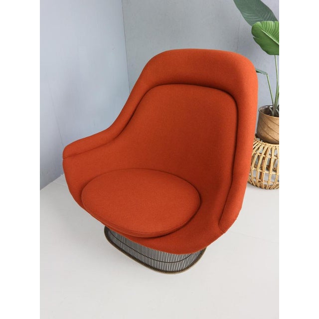 A bronze plated model 1705 throne chair and ottoman designed by Warren Platner for Knoll. Reupholstered in Tonus 4 by...