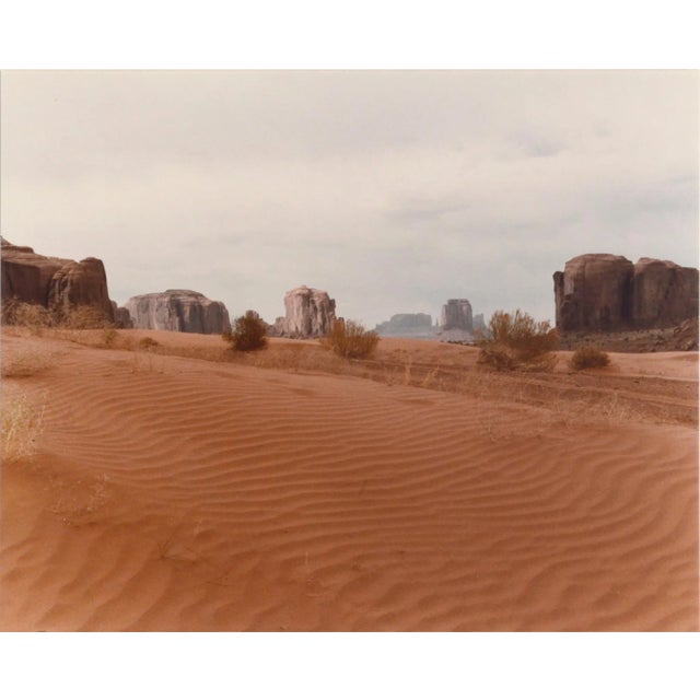 Photograph of Monument Valley by an unknown artist. Signed "CJB" in the lower right corner. Dated "April '84" in the lower...