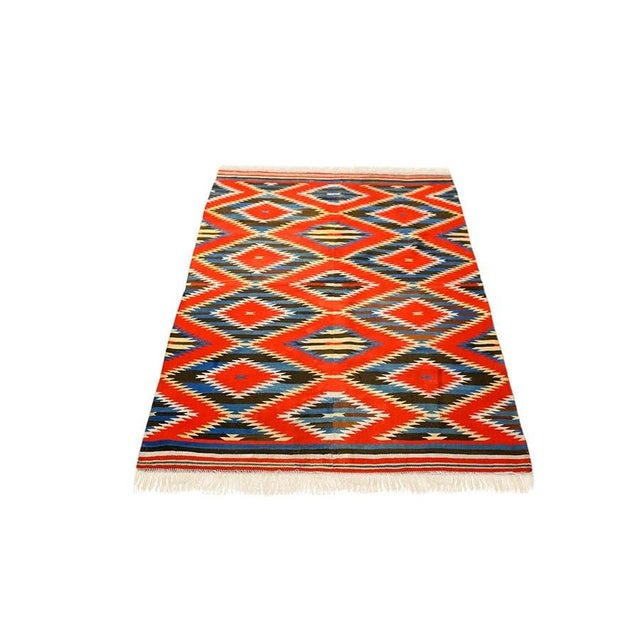 Antique Navajo Native American Allover Geometric Flat Weave Rug, Circa Date: 1890s. This exceptional example of late 19th-...