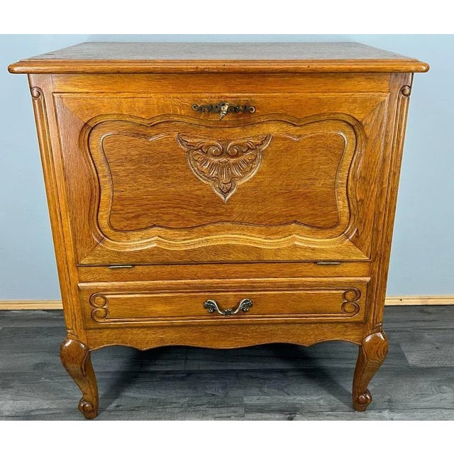 The Cabinet\.sideboard has one door and one drawer decorated with wonderful carvings, it rests on beautiful cabriole legs....