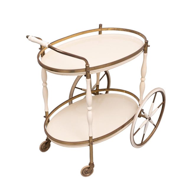 Very charming Serving Trolley or Bar Card. Oval-shaped, All original, comes complete with there Ecru colored glass tops...