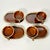 From Hull Pottery, this is a set of Lava Drip Brown Glazed Ironstone Pottery. The set is 8 pieces of 4 Soup Mugs and 4...