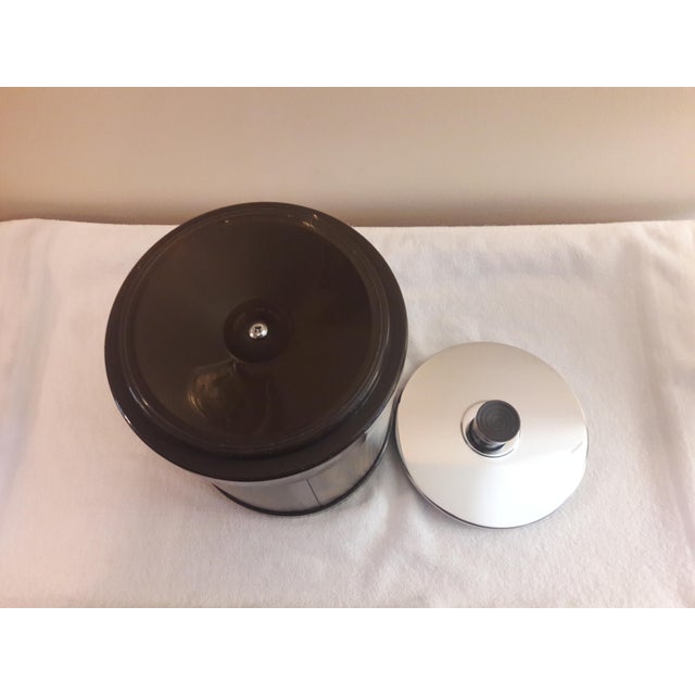 Vintage Retro Atapco Faux Wood Grain / Chrome Lid Round Ice Bucket. A beautiful example of Mid Century bareware is in...