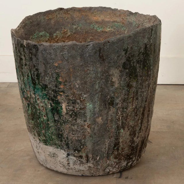 This large antique smelting pot was used for glass blowing and is a great example of industrial art. It is an object that...