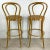Enhance your home bar with a touch of vintage charm and modern elegance with this Pair of Vintage Modern Cane Seat...
