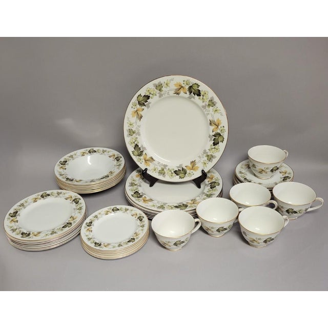 A 36-piece set of 6 complete place settings in Larchmont by Royal Doulton, one of the company’s most elegant mid-century...