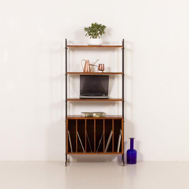 Italian vintage freestanding vinyl records wall unit from the 1970s. Designed as a modular and architectural storage...