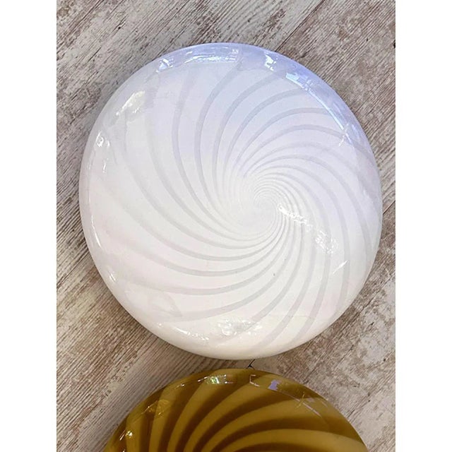Contemporary milky-white blowing glass with "rigadin ritorto" traditional murano working. the milky-white make a a warm...