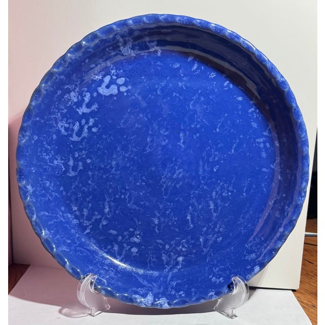 Bring a piece of American ceramic history into your kitchen with this stunning vintage Bybee Pottery pie plate....