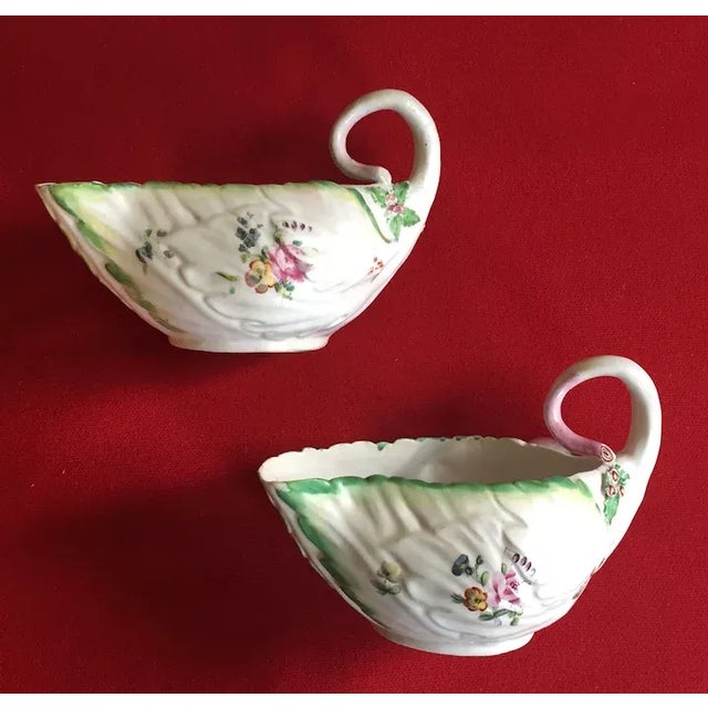 Pair antique 18th century English Georgian Chelsea Derby porcelain lettuce form sauce boats circa 1750 - 1760. Decorated...