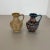 Set of 2 original vintage 1960s pottery ceramic vase made in germany. High quality german production with an abstract...