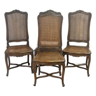 Early 20th Century Fruitwood Cane French Dining Chairs - Set of 4 For Sale
