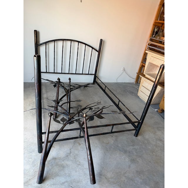 Bring the beauty of nature indoors with this stunning vintage handcrafted metal canopy queen bed frame. Artisan-made from...
