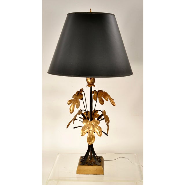Charming Italian table lamp, wrought iron with gilded oak leave decoration. New wiring. Shade shown is not included....