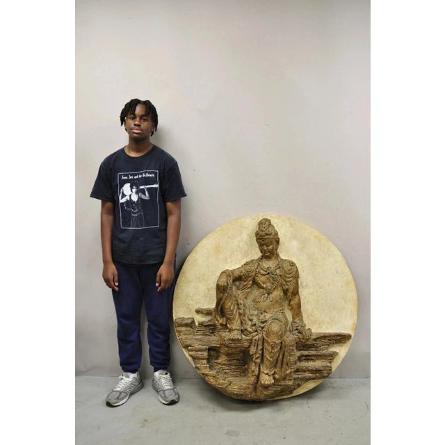 Large Vintage Fiberglass Kuan Shih Yin Buddha Relief Round Wall Art Sculpture. Item features a large impressive form,...
