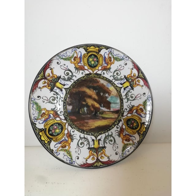 Beautiful ceremonial or parade plate by Riccardo Gatti, produced in the ceramic city of Faenza. Entirely hand-painted in...