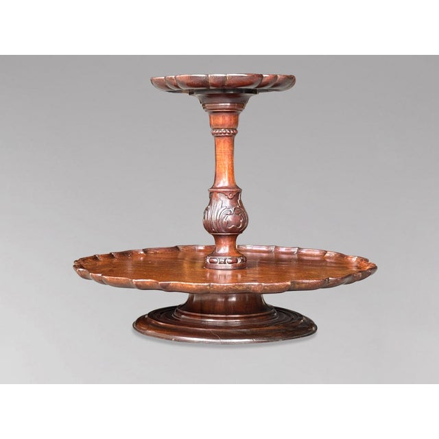 A mid 19th-century two-tier mahogany Lazy Susan. Each tier is beautifully grained and features a moulded pie-crust edge,...