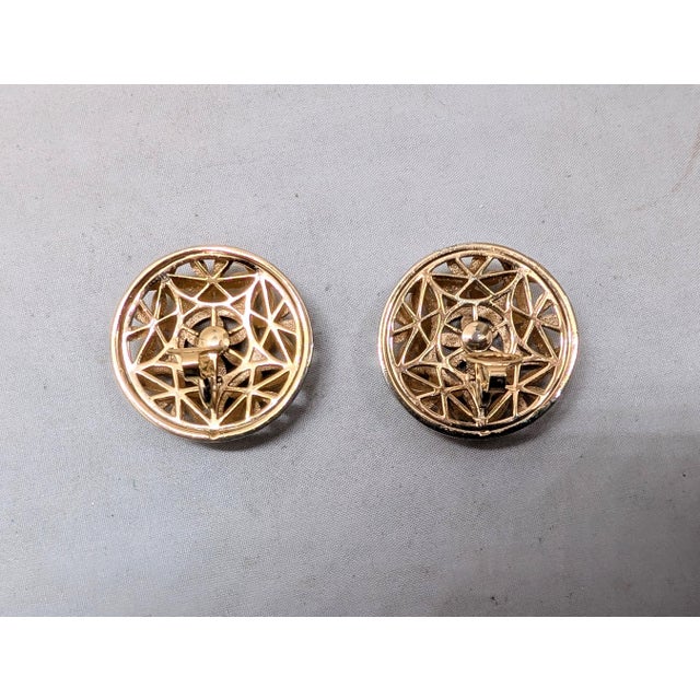 Metal Vintage 1960s Signed Crown Trifari Goldtone Round Cut Out Flower Clip Earrings-2 Pieces For Sale - Image 7 of 7