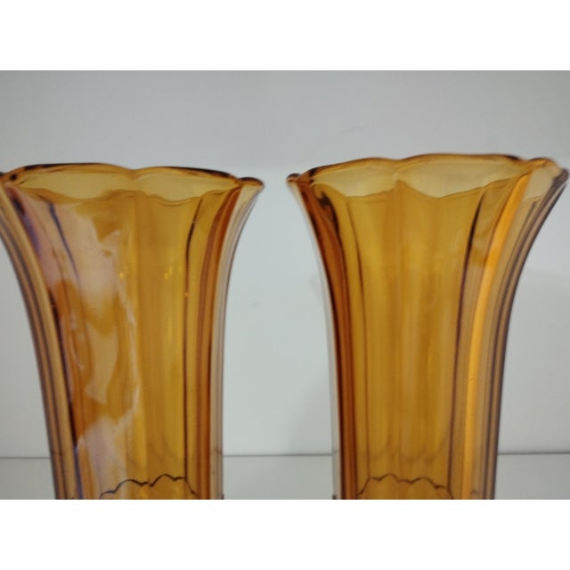 Pair of vases from the Val-Saint-Lambert crystal factory. Company founded in 1826. Amber color. Signature: under the base....