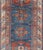 Measures: 4'4 x 8'9 Antique Persian Kurdish Gallery Rug with Blue Field and Bold Geometric Medallion. Keivan Woven Arts/...