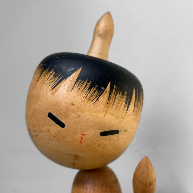 A rare and characterful creative-style Kokeshi titled "Tsuioku", which means "recollection" or "remembrance" in Japanese....
